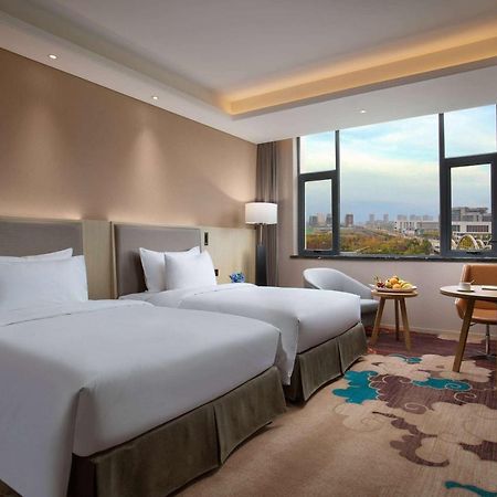 Ramada Wyndham Zhengzhou Xinzheng Hotel Hszincseng Kültér fotó