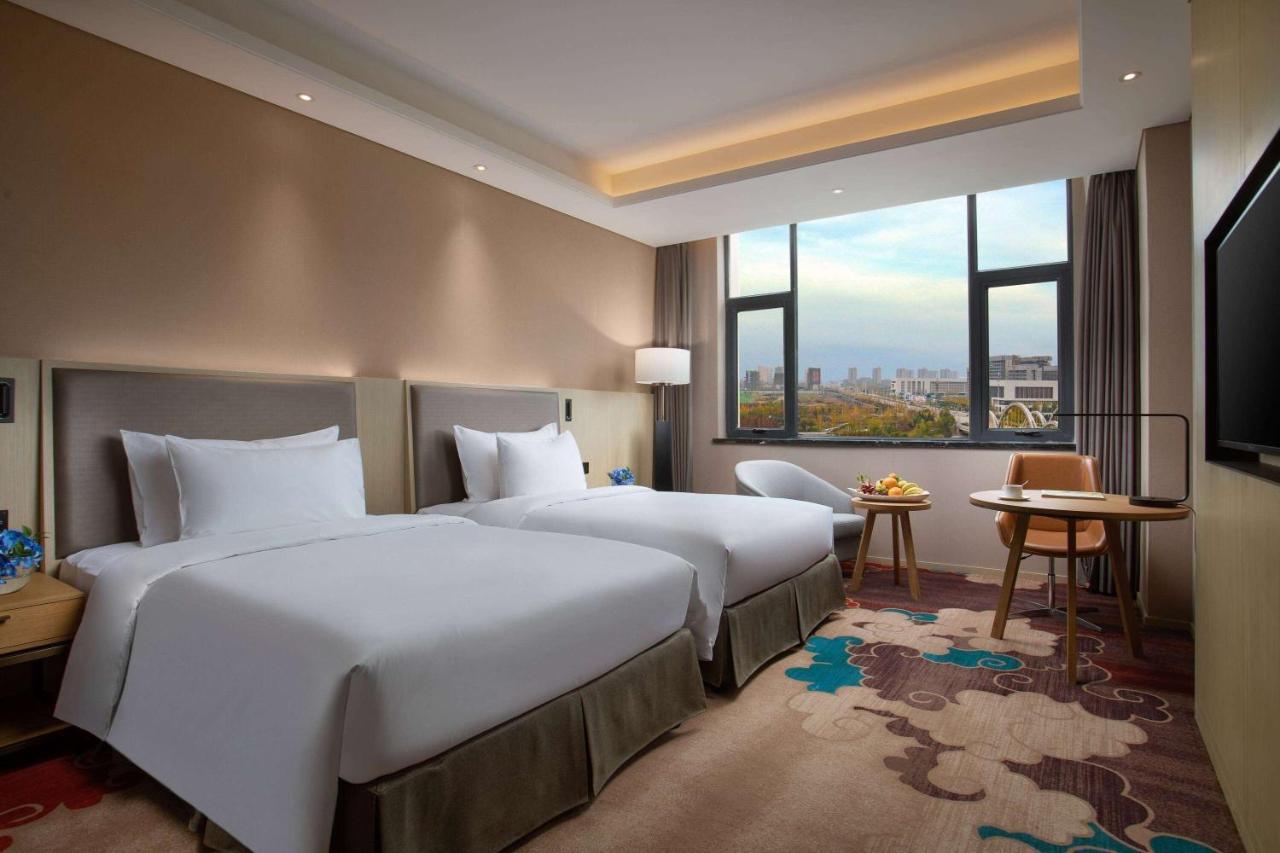 Ramada Wyndham Zhengzhou Xinzheng Hotel Hszincseng Kültér fotó