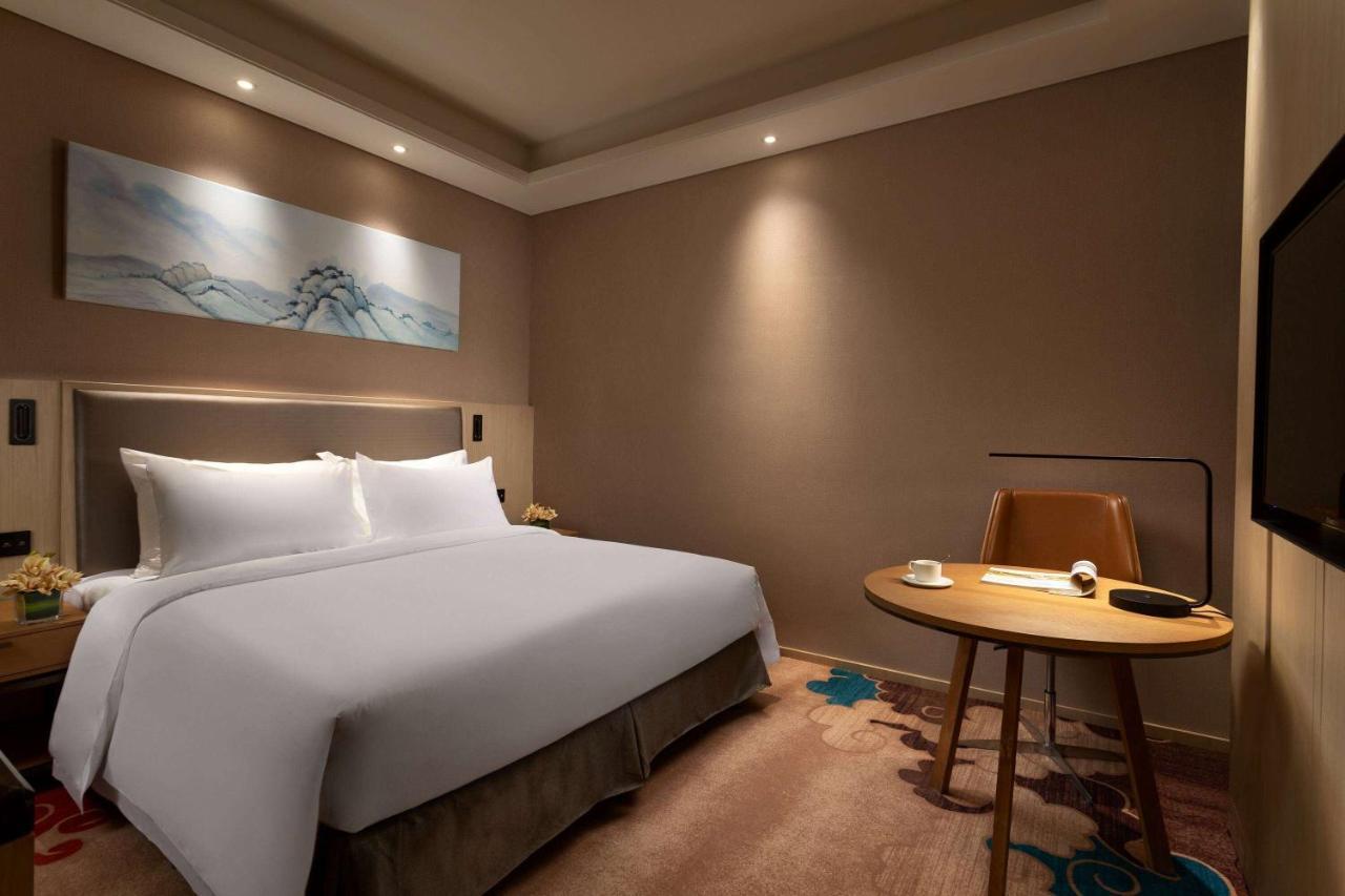 Ramada Wyndham Zhengzhou Xinzheng Hotel Hszincseng Kültér fotó